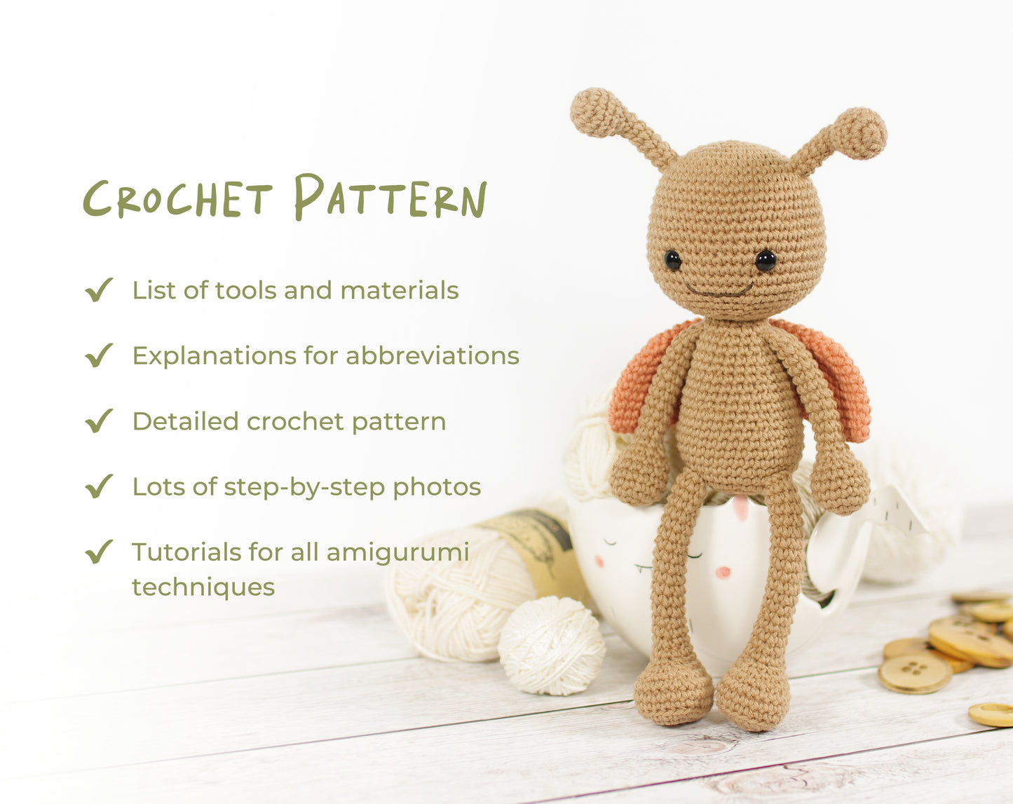 Crocheted toy with butterfly wings on a white background, accompanied by text about crochet pattern details.